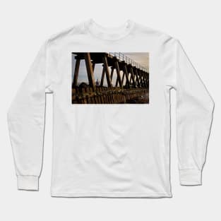 Lighthouse through the wooden pier Long Sleeve T-Shirt